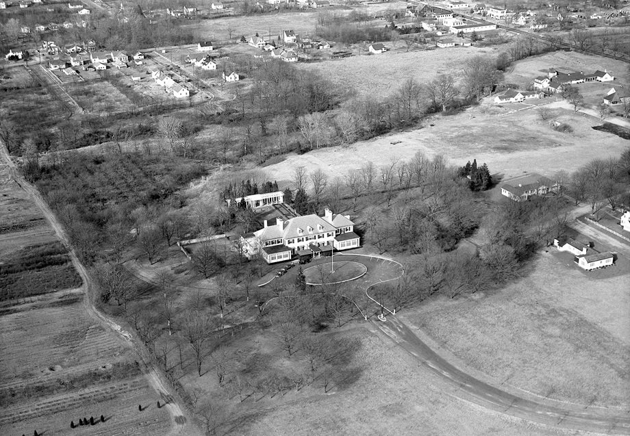 A historic black-and-white aerial view of Shadow Brook Farm