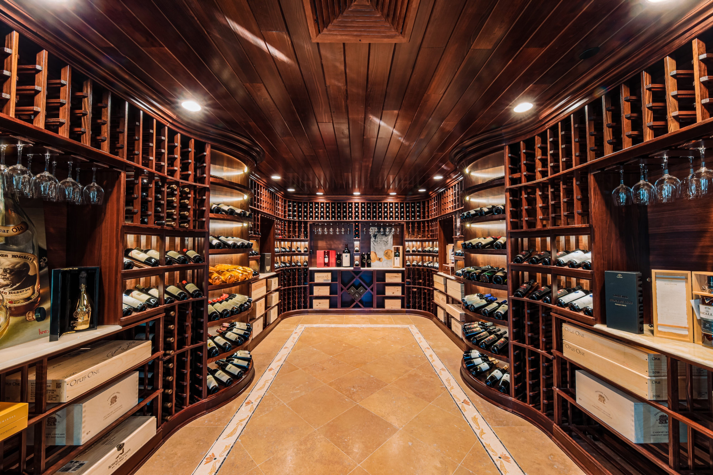 The wood-panelled wine cellar